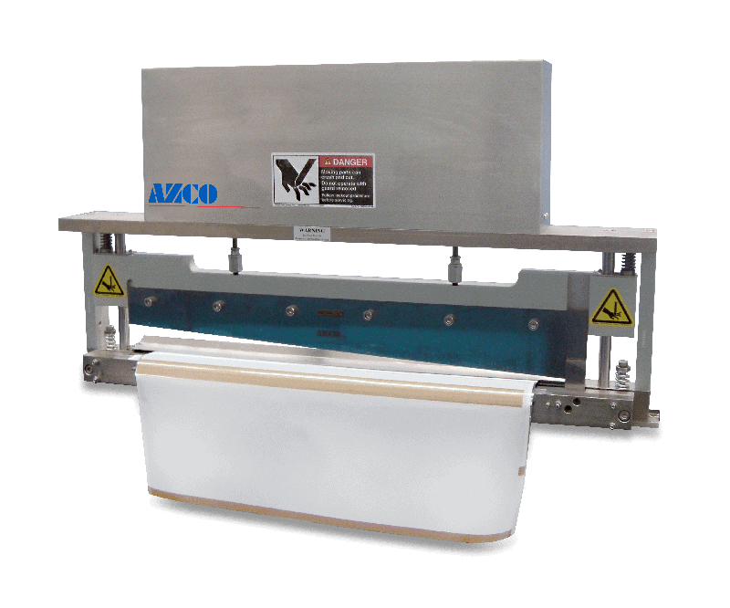 High speed dual cut guillotine knife assembly cuts material and removes slugs from in-between the finished cut product pieces